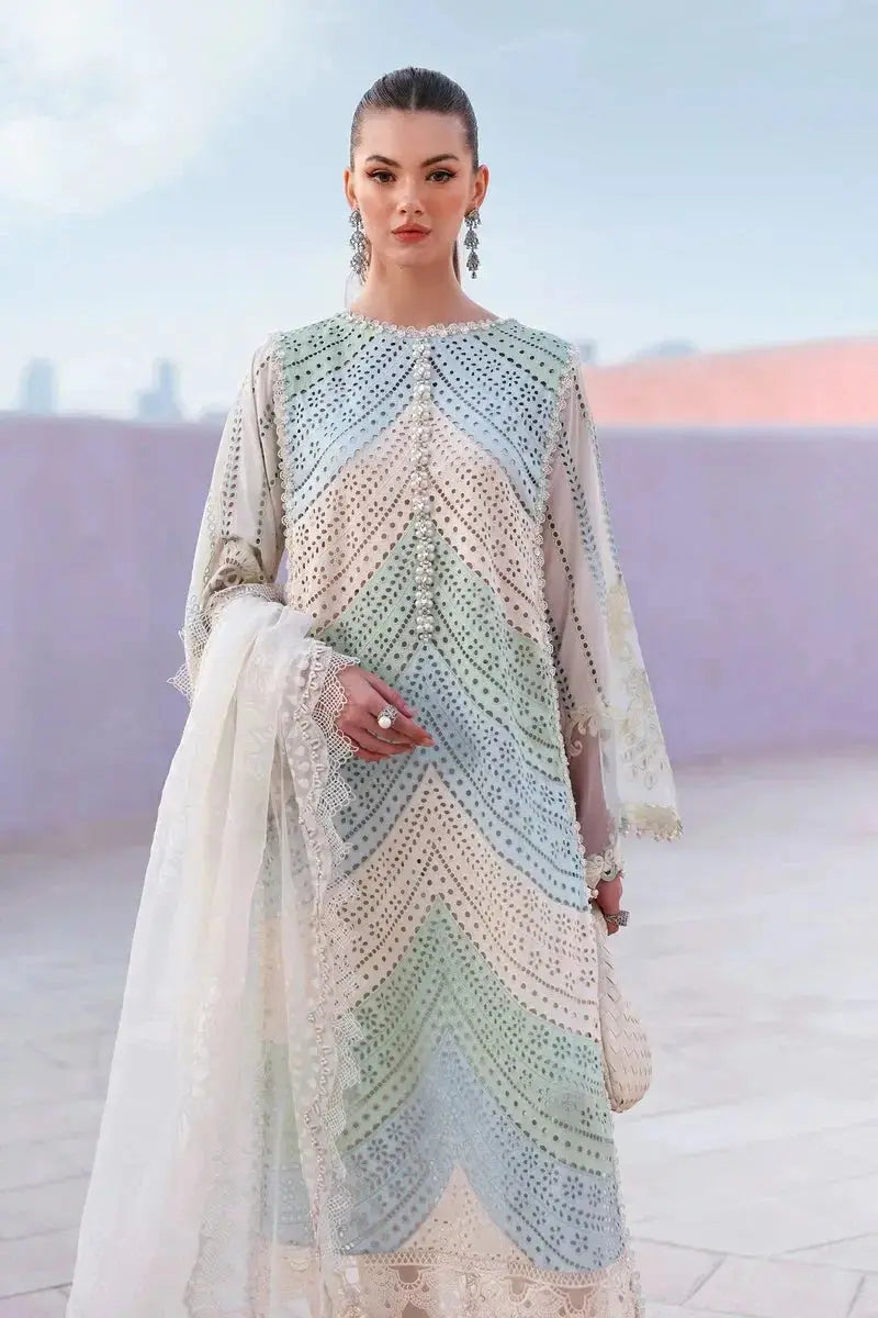 Woman wearing a colorful crocheted dress with a blurred background