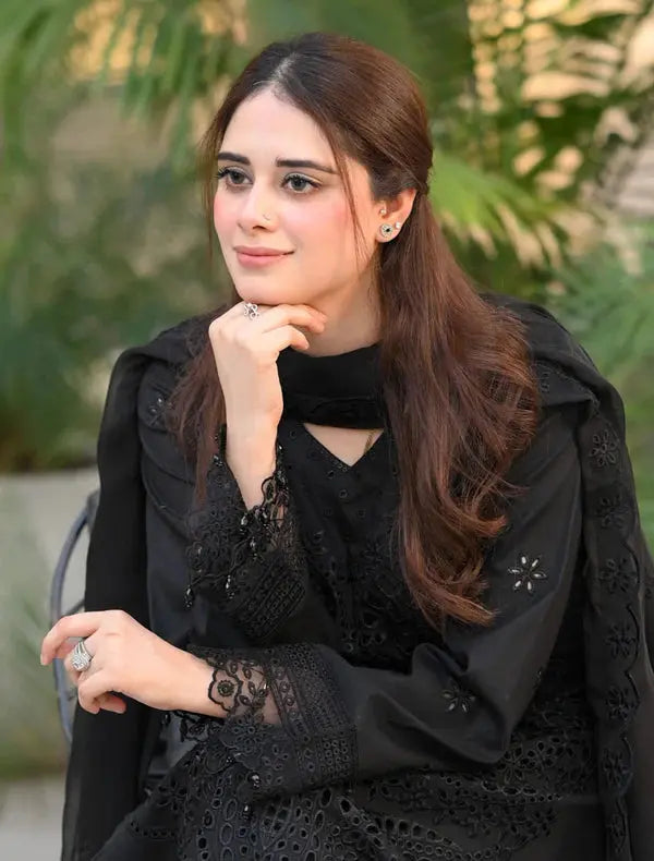 woman wearing chikankari embroidered lawn suit